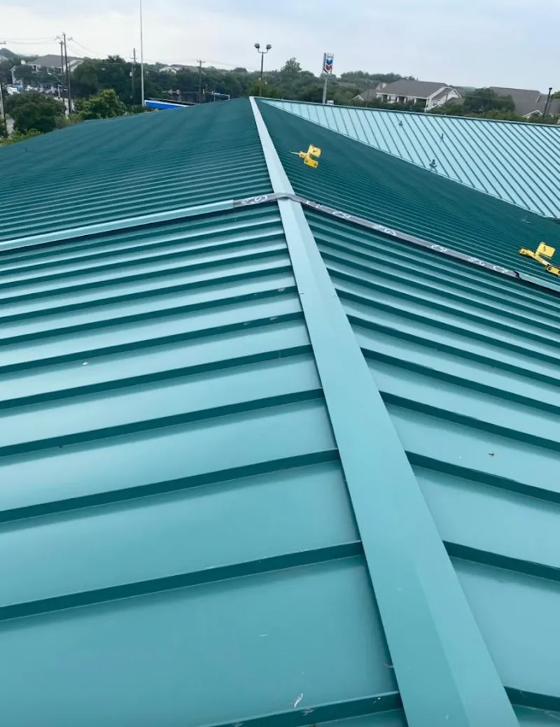 Green commercial metal roof ridge and valley for Metal Roof Repair in Auburn Hills