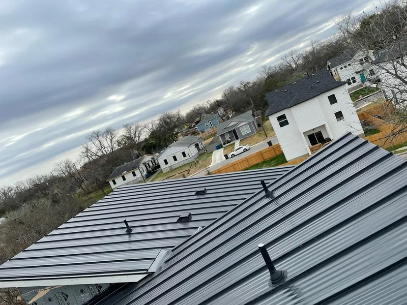Standing seam metal roof panels with vents for Skylight Repair in Auburn Hills
